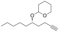 2-[(5S)-dec-1-yn-5-yloxy]oxane